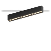 трековый линейный светильник с вытянутым прямоугольным корпусом и рядом утопленных источников света