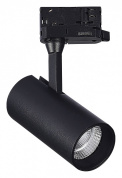 трековый прожектор на штанге с цилиндрическим корпусом черного цвета для трехфазного шинопровода