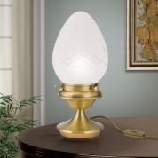 настольный светильник с овальным стеклянным рассеивателем на бронзовой подставке