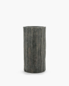 напольное кашпо цилиндрической формы из темного камня