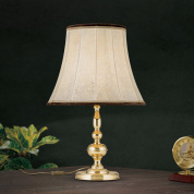 настольная лампа с тканевым абажуром на фигурной латунной стойке