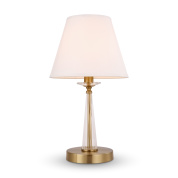 настольная лампа с абажуром из ткани и круглым основанием из латуни