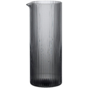 стеклянный молочник цилиндрической формы с рифлеными стенками из тонированного стекла