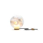 настольный светильник с плафоном из прозрачного стекла округлой формы