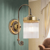 одноламповое настенное бра с цилиндрическим стеклянным плафоном и патинированным корпусом