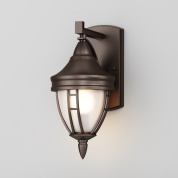 настенный уличный светильник в форме фонаря черного цвета