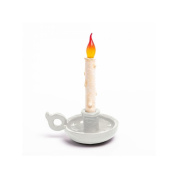 настольная лампа с пламенем в виде свечи на подставке