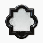 настенное зеркало в фигурной раме чёрного цвета в стиле ар-деко