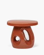 круглый приставной столик с монолитным скульптурным основанием