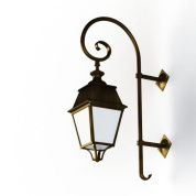 настенное бра бронзового оттенка с прозрачным плафоном на фигурном держателе