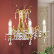 трёхрожковое хрустальное настенное бра с декоративной арматурой в золоте