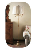 торшер с высоким металлическим каркасом и текстильным абажуром