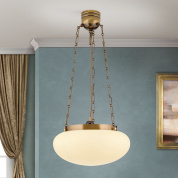 подвесной потолочный светильник с крупным овальным стеклянным плафоном в тоне шампанского