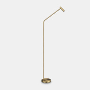 торшер с изогнутым штативом и конусным плафоном из матовой латуни