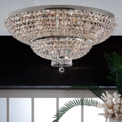 масштабная потолочная люстра с кристальными подвесками и хромированной оправой