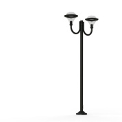 уличный фонарь с двумя рожками и полусферическими плафонами на тёмной стойке