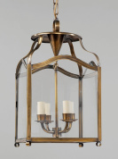 подвесной фонарь прямоугольной формы с прозрачными стеклянными панелями и латунной рамой