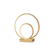 настольная лампа кольцевой формы золотого оттенка