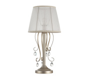 настольная лампа с абажуром кремового цвета и декоративными завитками на ножке с золотистыми элементами