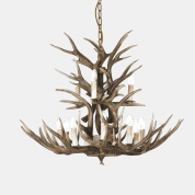 подвесная люстра с рожками в виде ветвей и бежевыми элементами декора