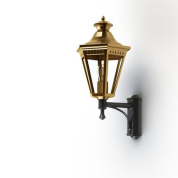 настенное бра золотистого цвета с прозрачным плафоном на декоративном держателе