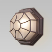 уличный настенный светильник с многогранным плафоном в металлической решетке