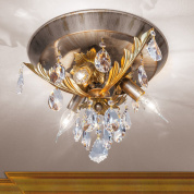 потолочная хрустальная люстра с каскадом подвесок и серебристо-золотой чашей