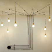 подвесная люстра с множеством ламп на длинных проводах в минималистичном стиле
