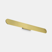 настенный светильник вытянутой округлой формы увеличенной длины с направленным светом вверх и вниз в латунном корпусе