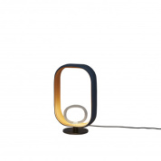 настольный светильник с овальной рамой и светодиодным модулем внизу корпуса