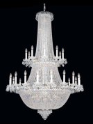 подвесная хрустальная люстра с высоким вытянутым корпусом и множеством кристаллических нитей