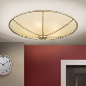 потолочный светильник с крупным тканевым куполом и декоративной патинированной окантовкой