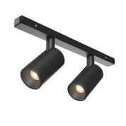 трековый прожектор с двумя цилиндрическими корпусами черного цвета