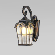 уличный настенный фонарь с металлическим корпусом и стеклянными панелями