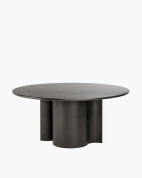 круглый обеденный стол с массивной столешницей и цилиндрическими опорами