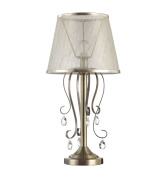 настольная лампа с тканевым абажуром и бронзовым основанием с декоративными элементами