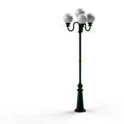 уличный фонарный столб зелёного цвета с тремя стеклянными плафонами