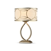 настольная лампа с круглым абажуром и изогнутой ножкой в золотом оттенке