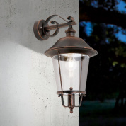 уличный настенный светильник фонарного типа с прозрачным стеклом и декоративной арматурой
