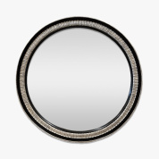 круглое настенное зеркало с тонкой рамой в винтажном стиле