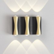 настенное бра с плавным корпусом цвета латунь с направлением света вверх и вниз