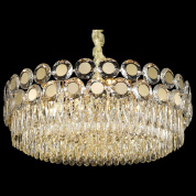 подвесная люстра с округлой рамой и хрустальными подвесками