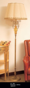 напольный торшер с высоким текстильным абажуром и фигурной стойкой