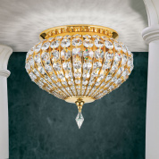 потолочная хрустальная люстра с плотной кристальной россыпью и золотистой окантовкой