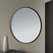 круглое настенное зеркало в чёрной металлической раме