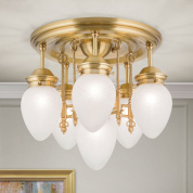 потолочный светильник с пятью матовыми каплевидными плафонами и центральным декоративным модулем в бронзовой отделке