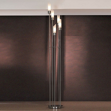 торшер с вытянутыми металлическими стойками и цилиндрическим плафоном