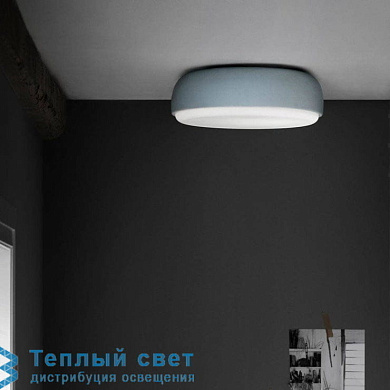 настенный светильник с круглым корпусом и мягким направленным светом