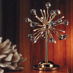 настольный декоративный светильник с позолоченной основой и множеством хрустальных вставок