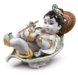 Фарфоровая статуэтка младенца Кришны на листе Krishna on Leaf Lladro 01009370